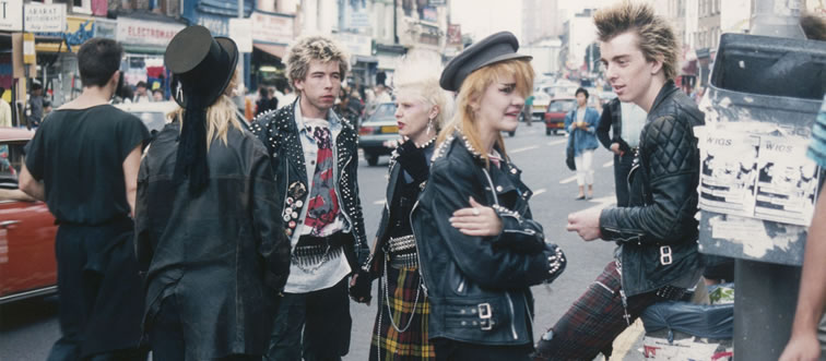 Which everyday fastener was subverted into a defining ornament of 1980s punk style?