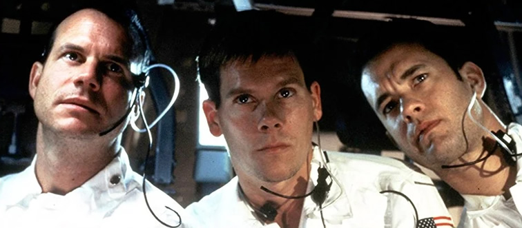 Which film features the tense, orbit-altering transmission: "Houston, we have a problem."?