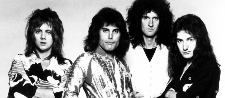 Which legendary rock outfit was fronted by the magnetic Freddie Mercury?